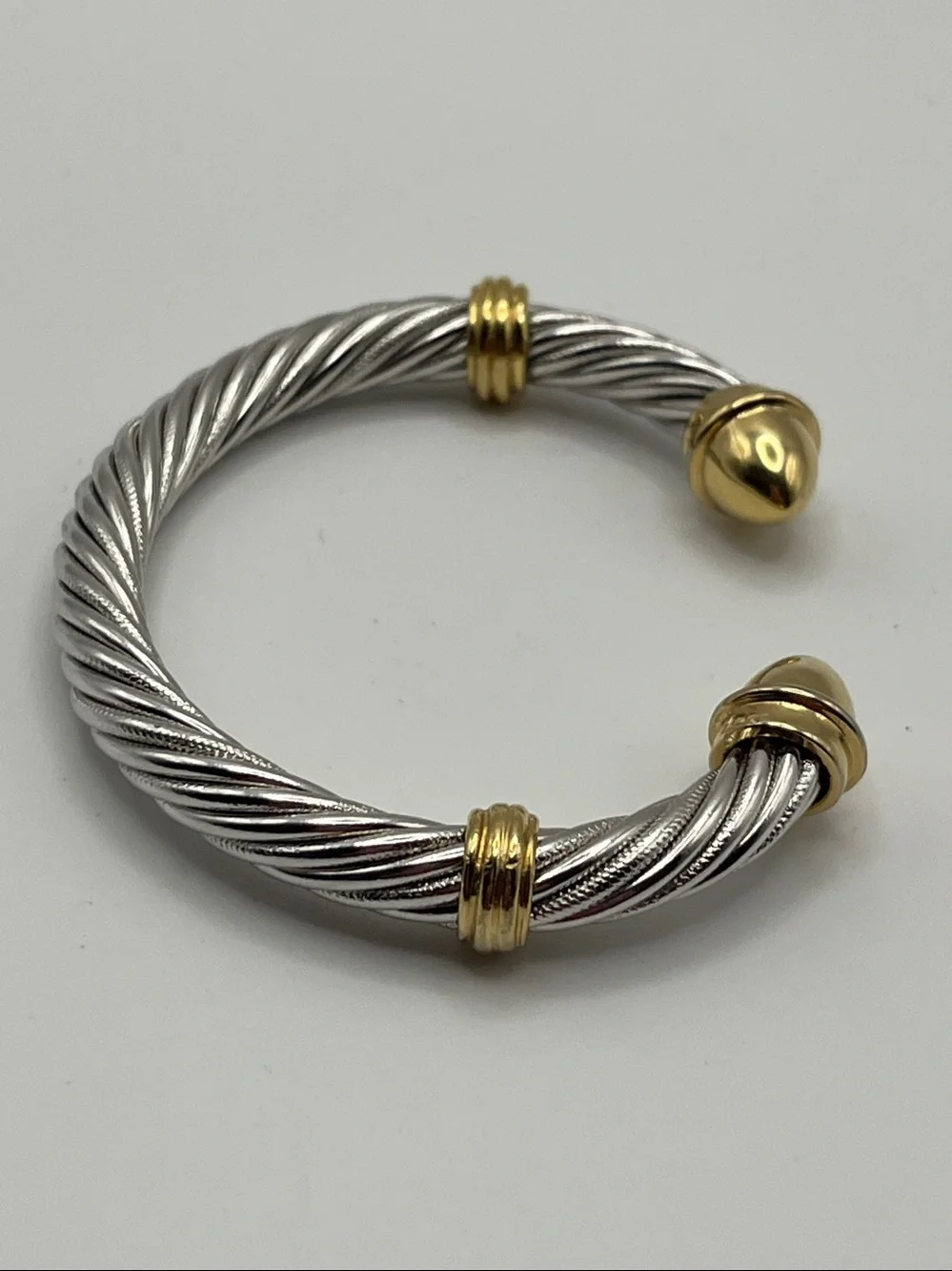 Silver-Tone Twisted Cable Cuff Bracelet with Gold Tone Accents